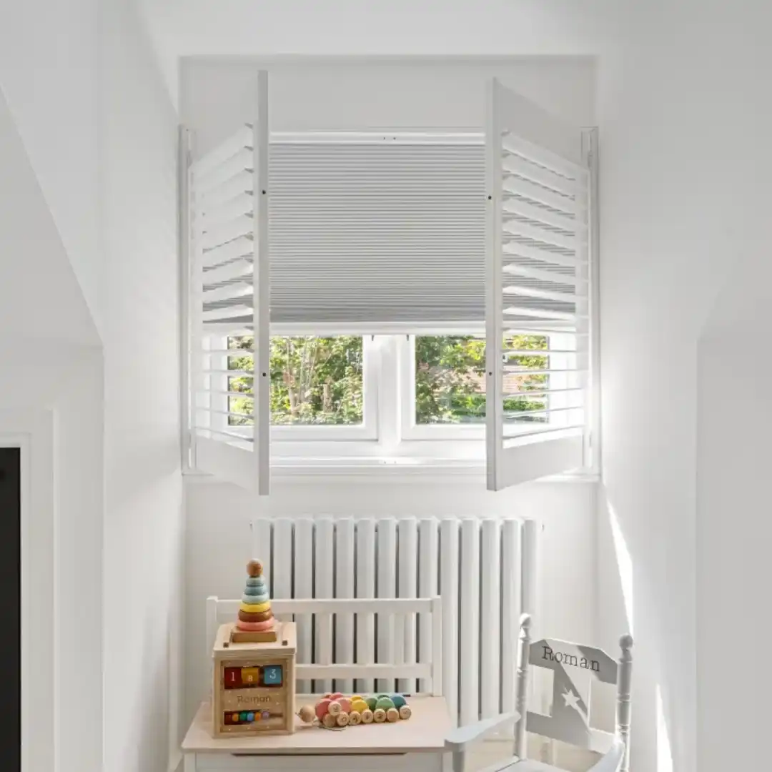 Image of blackout blinds with shutters in a modern setting